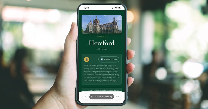 Visitor holding phone showing the Hereford StorieD tour